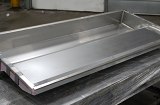 Stainless steel delicatessen case liner. Complete assembly including cutting, forming, welding, insulation and assembly.