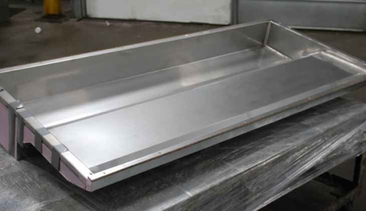Stainless steel delicatessen case liner. Complete assembly including cutting, forming, welding, insulation and assembly.