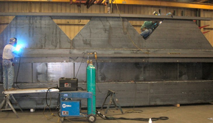 Custom steel work center with accommodation for exhaust