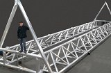 Tubular aluminum bridge structure for the University of Iowa’s Wave Basin Laboratory that spans a 150 foot wide pool.  3D laser cut tubes and welded to close tolerance. [As Fabricated]