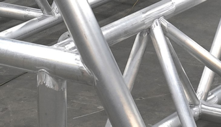 Tubular aluminum bridge structure for the University of Iowa’s Wave Basin Laboratory that spans a 150 foot wide pool. Laser cut tubes and welded to close tolerance. [Close Up]