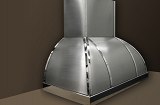 Stainless steel wall-mounted kitchen hood. Material number 4 polished with chrome finished trim. Complete fabrication – cut, formed, rolled, corner welded with blending and surface finished.