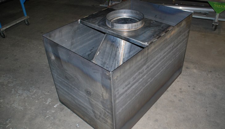 Complete fireplace fabrication constructed of ¼” mild steel. Subsequent operations included refractory and brick finish.