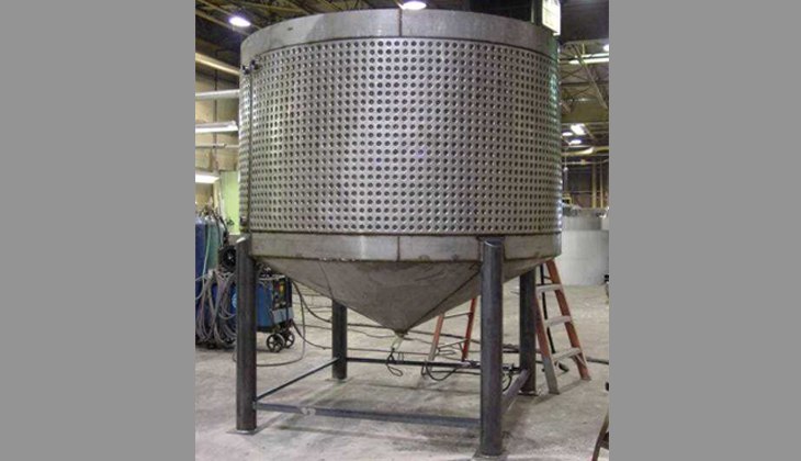 Steel tank with external cooling jackets. Complete fabrication with cutting, forming and welding.